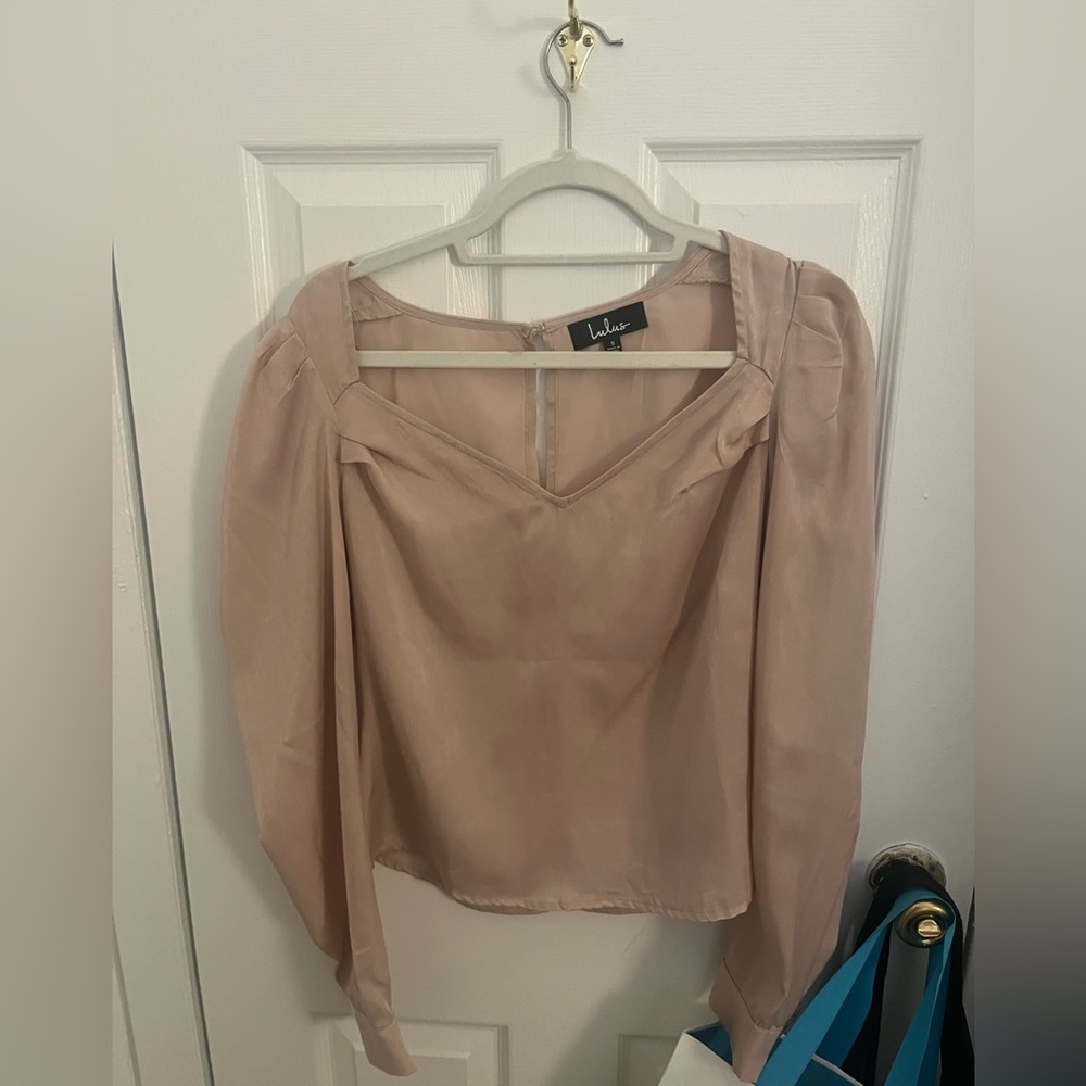 Lulu’s pale pink blouse